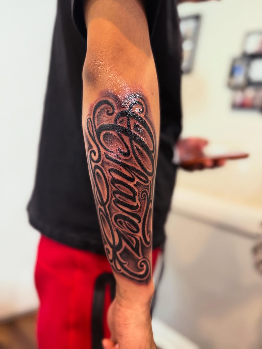 Tattoo by @nini_inkz — lettering_script, black_and_grey