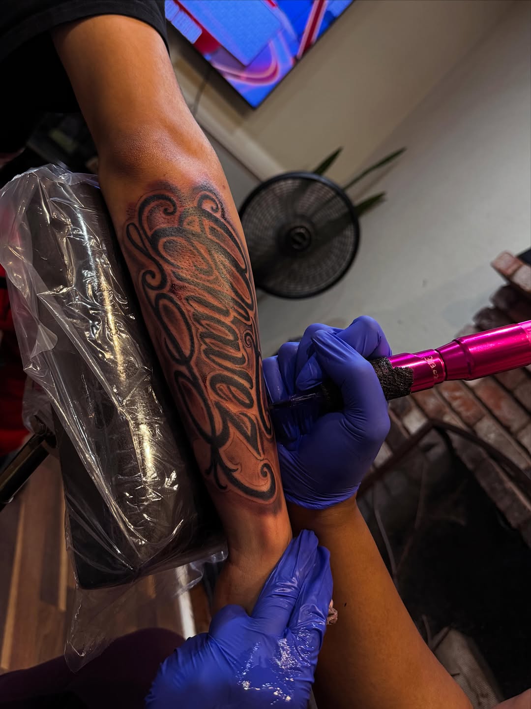 Tattoo by @nini_inkz — lettering_script, blackwork