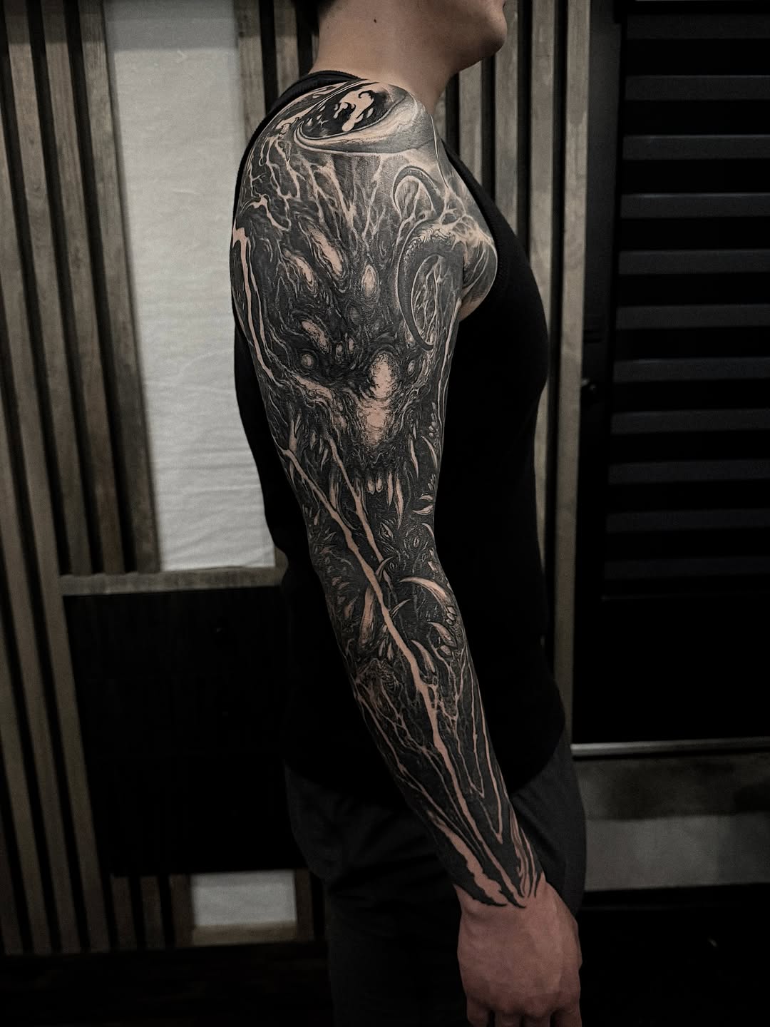 Tattoo by @rokyeom_ — black_and_grey, dark_realism