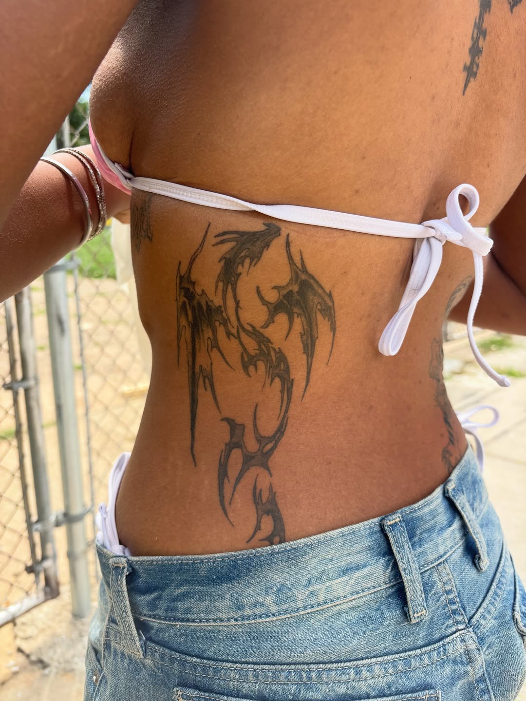 Tattoo by @inknerm — illustrative, blackwork
