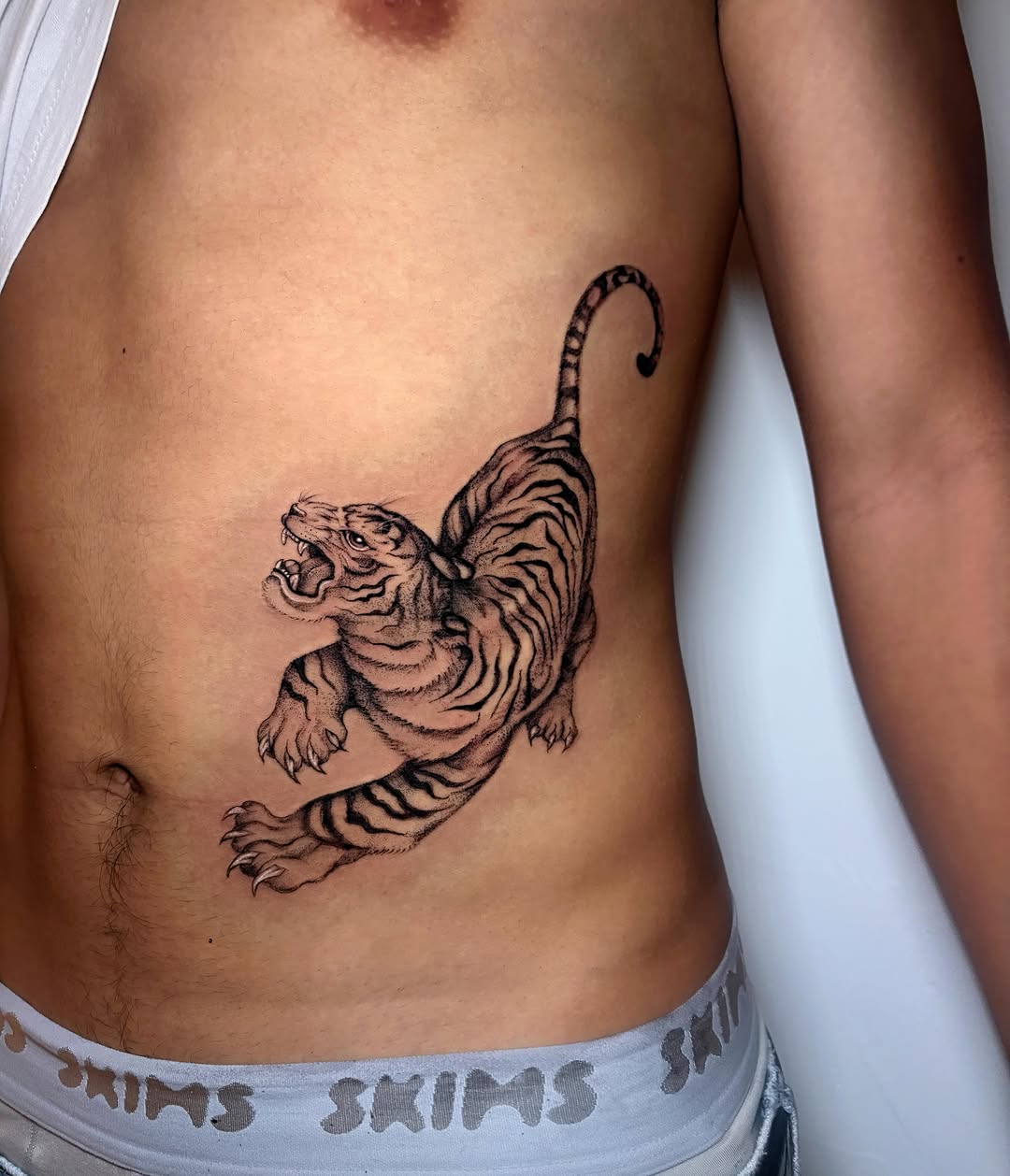 Tattoo by @liz.tattooz — black_and_grey, realism