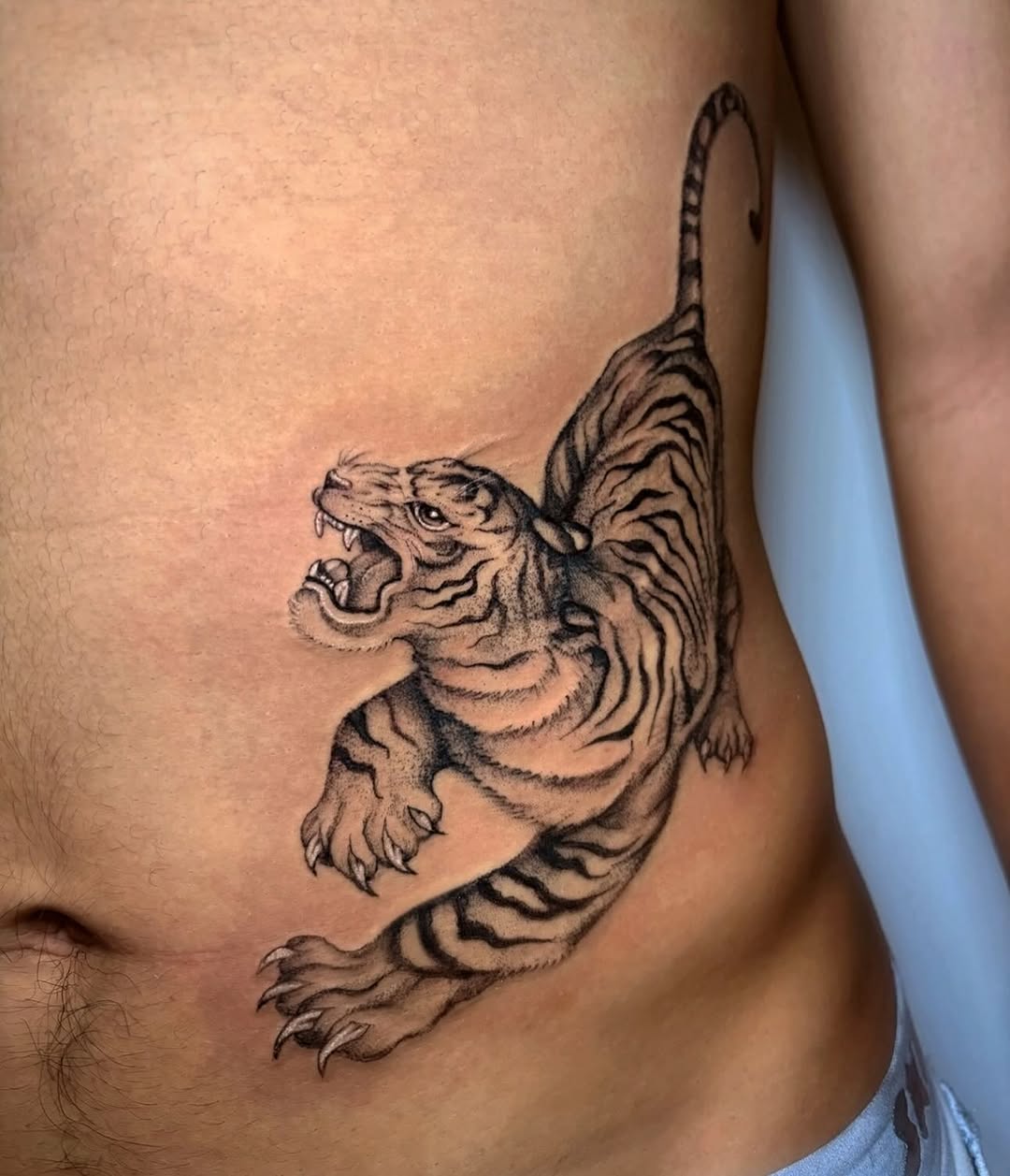 Tattoo by @liz.tattooz — black_and_grey, realism