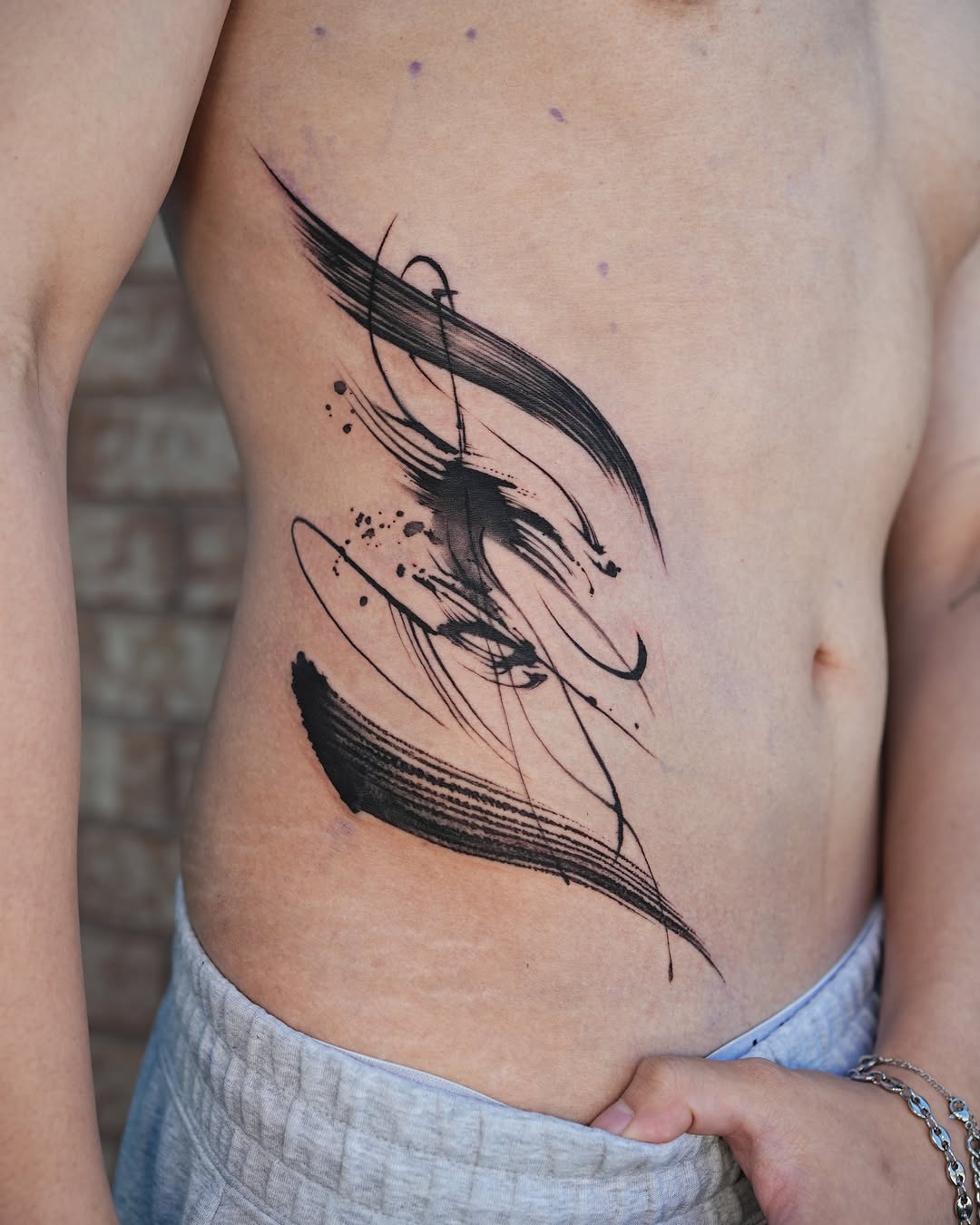 Tattoo by @jiya.brush — blackwork, illustrative