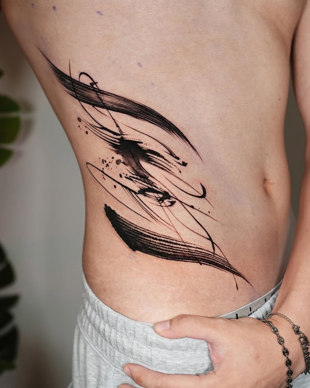 Tattoo by @jiya.brush — blackwork, illustrative
