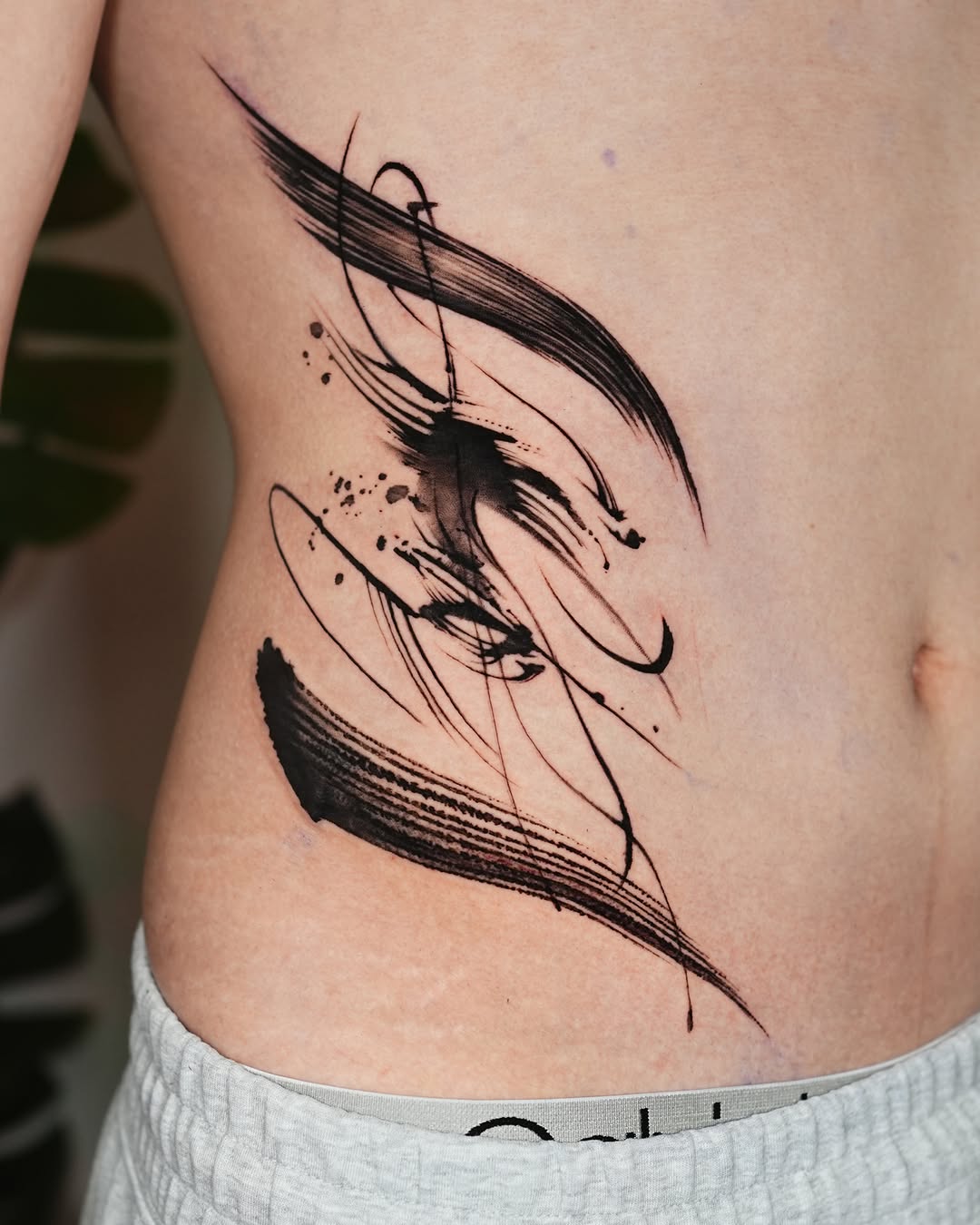 Tattoo by @jiya.brush — blackwork, illustrative
