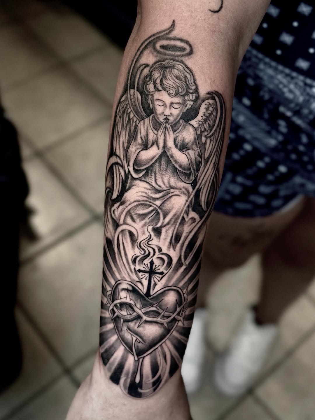 Tattoo by @stilow_ink — black_and_grey, realism