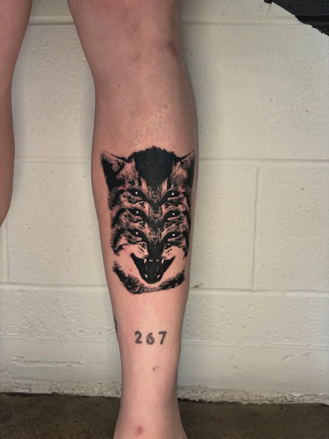 Tattoo by @lil_stinker_5000 — black_and_grey
