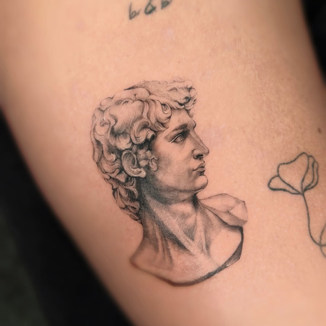 Tattoo by @yuta.tatt β realism, black_and_grey