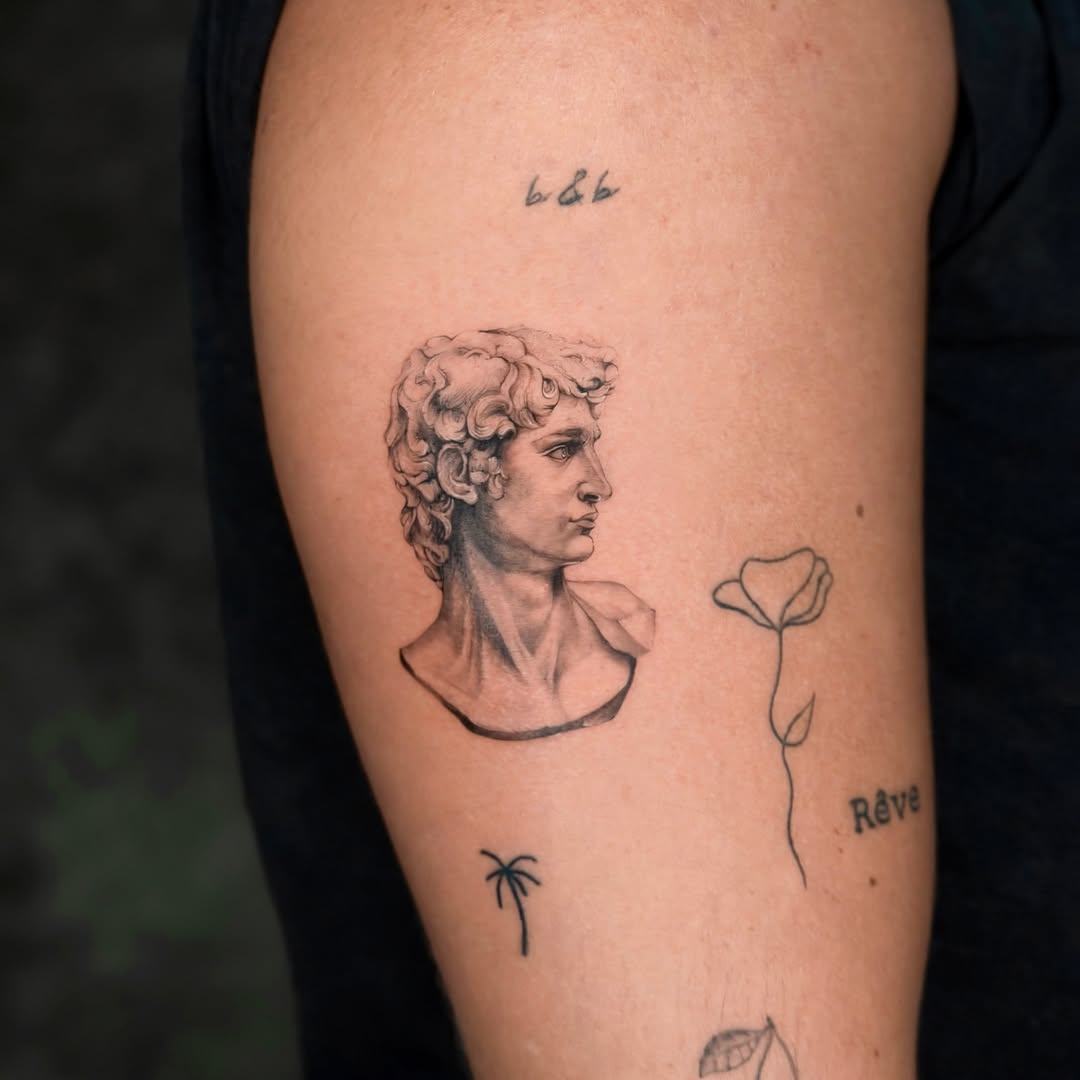Tattoo by @yuta.tatt β realism, black_and_grey