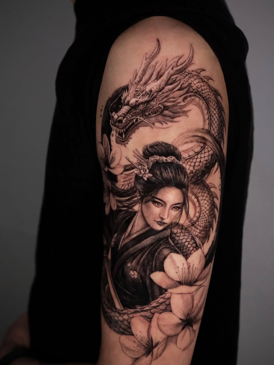Tattoo by @da.an_tattooer — black_and_grey, realism