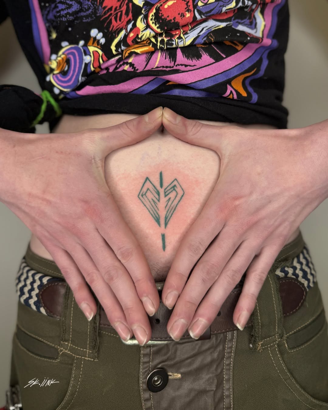 Tattoo by @sk.iink — geometric, illustrative