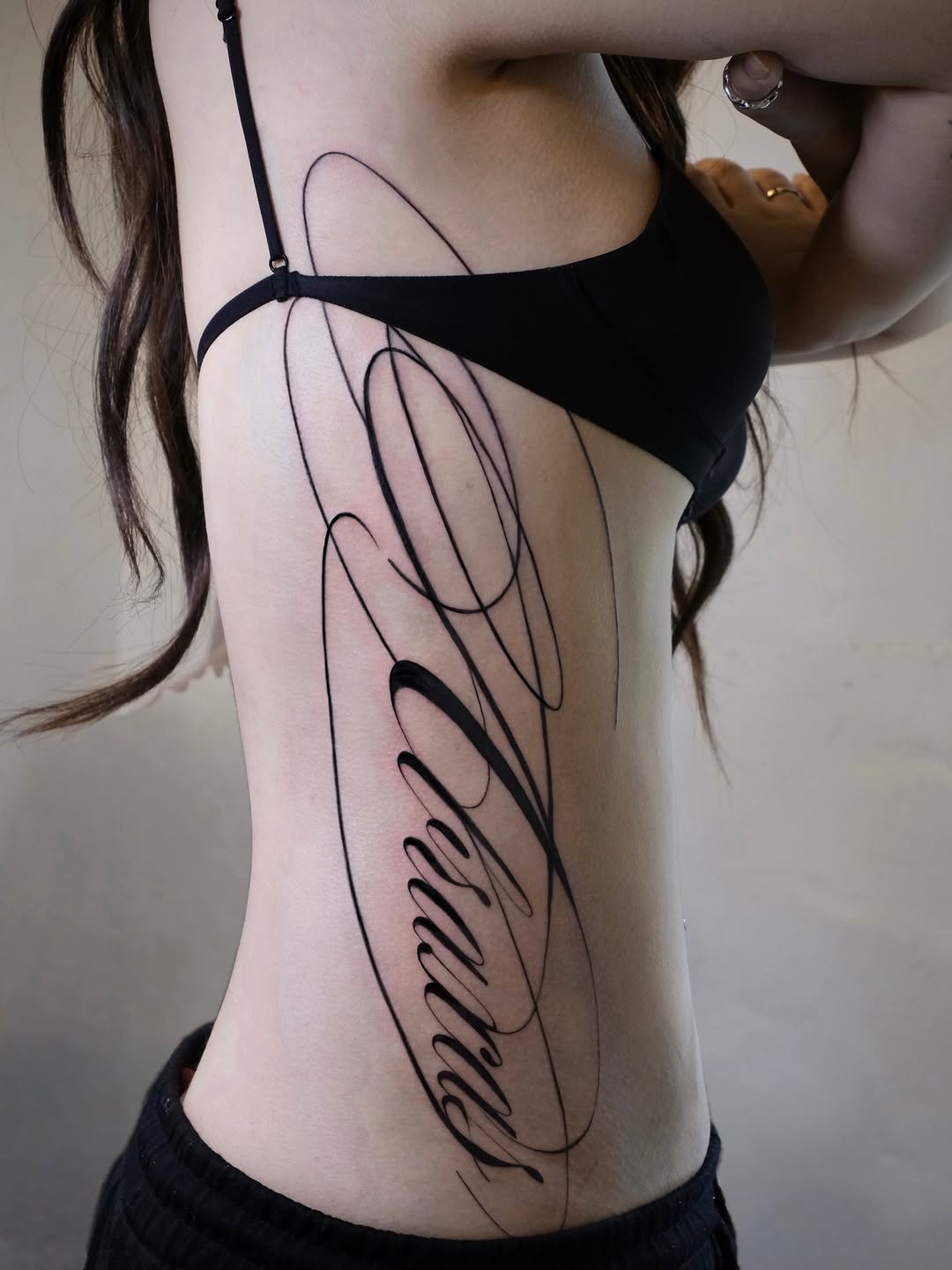 Tattoo by @seul.ttt — lettering_script, fine_line