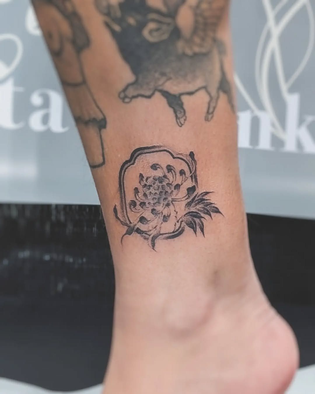 Tattoo by @tatie.ink โ japanese_irezumi, black_and_grey