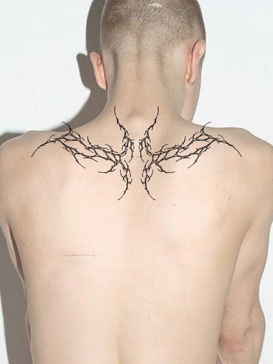 Tattoo by @tiimy.tt — blackwork, geometric