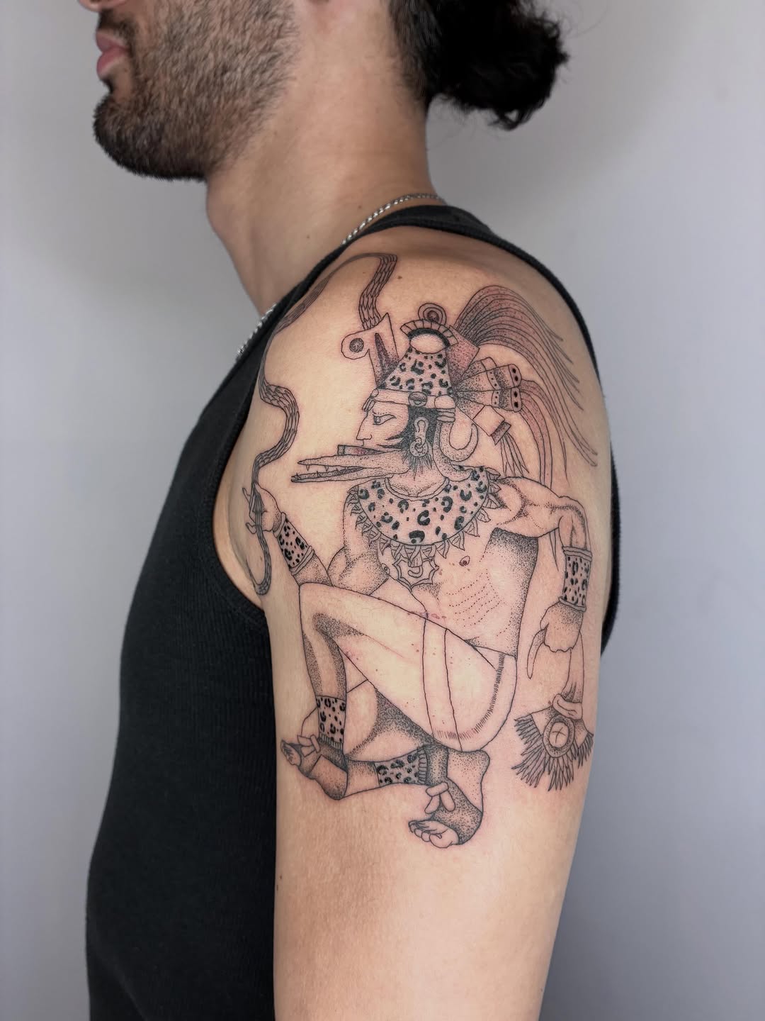 Tattoo by @geisha_ocelotl — illustrative, dotwork