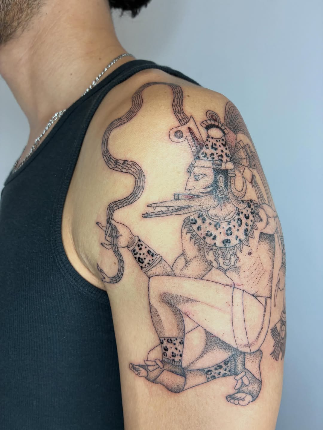Tattoo by @geisha_ocelotl — illustrative, blackwork