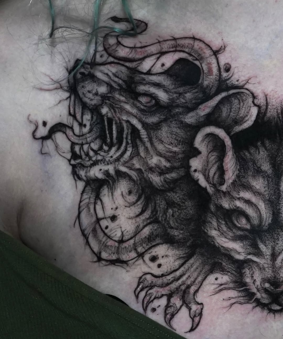 Tattoo by @evi_berry_falcon โ dark_realism, blackwork