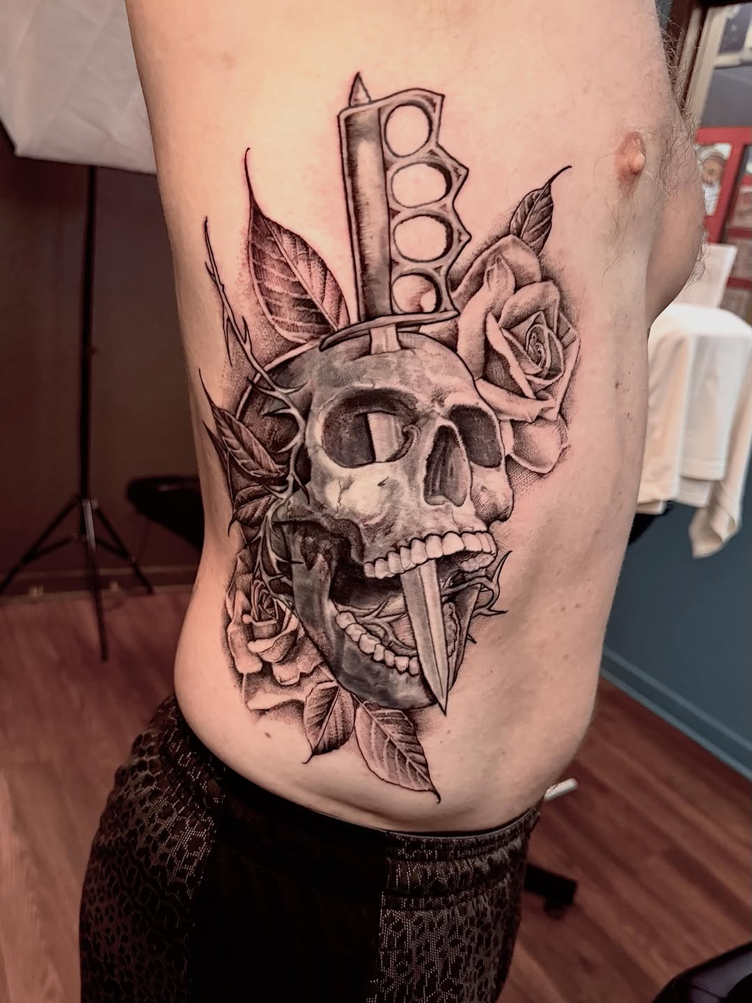 Tattoo by @inkedby_adam — black_and_grey, realism