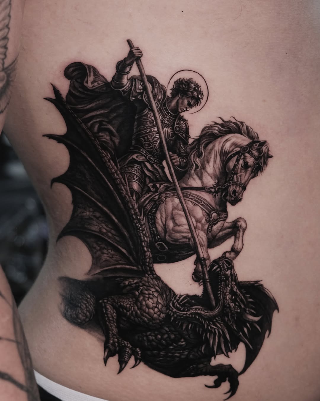 Tattoo by @by.daho โ realism, black_and_grey