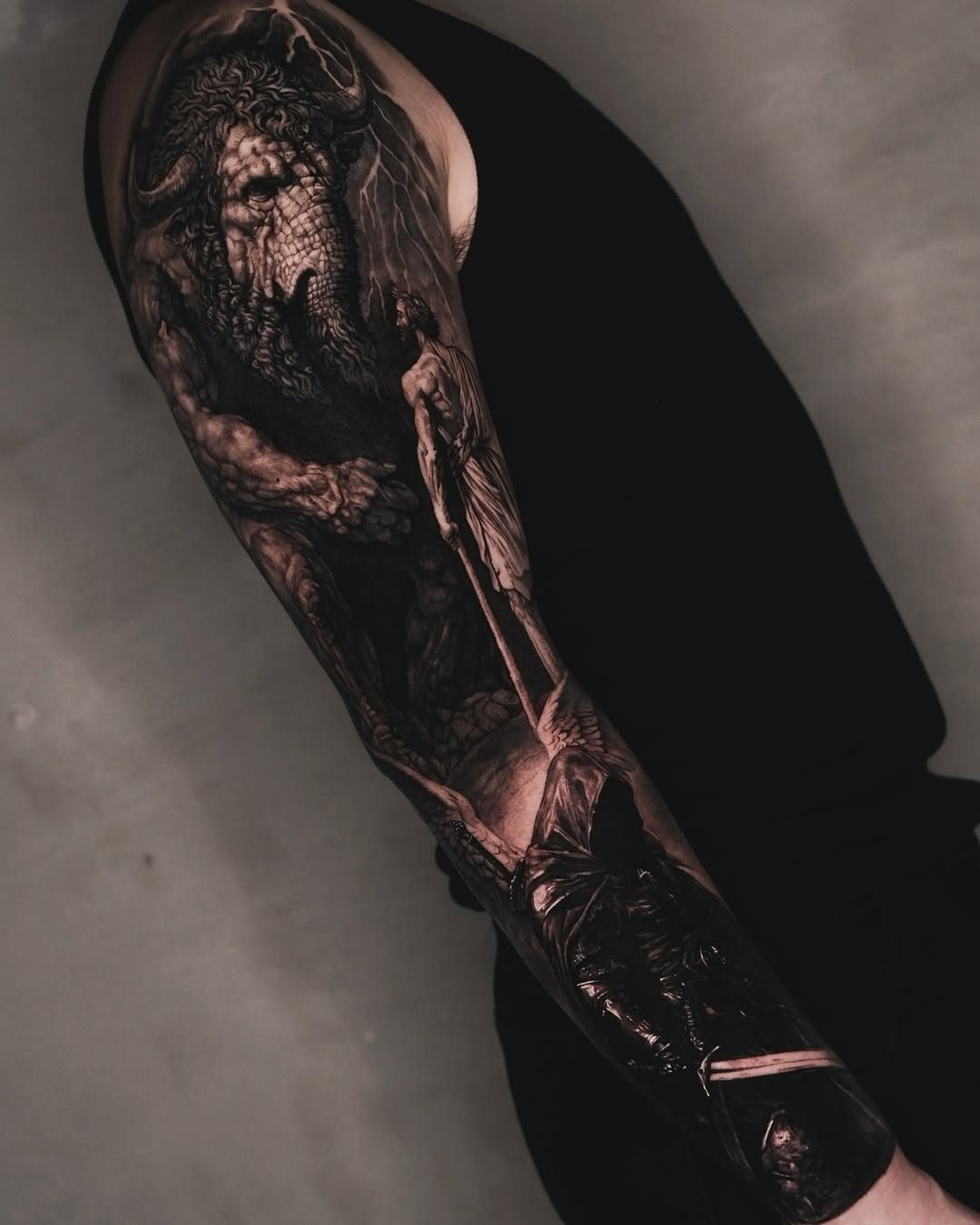 Tattoo by @by.daho โ dark_realism, black_and_grey