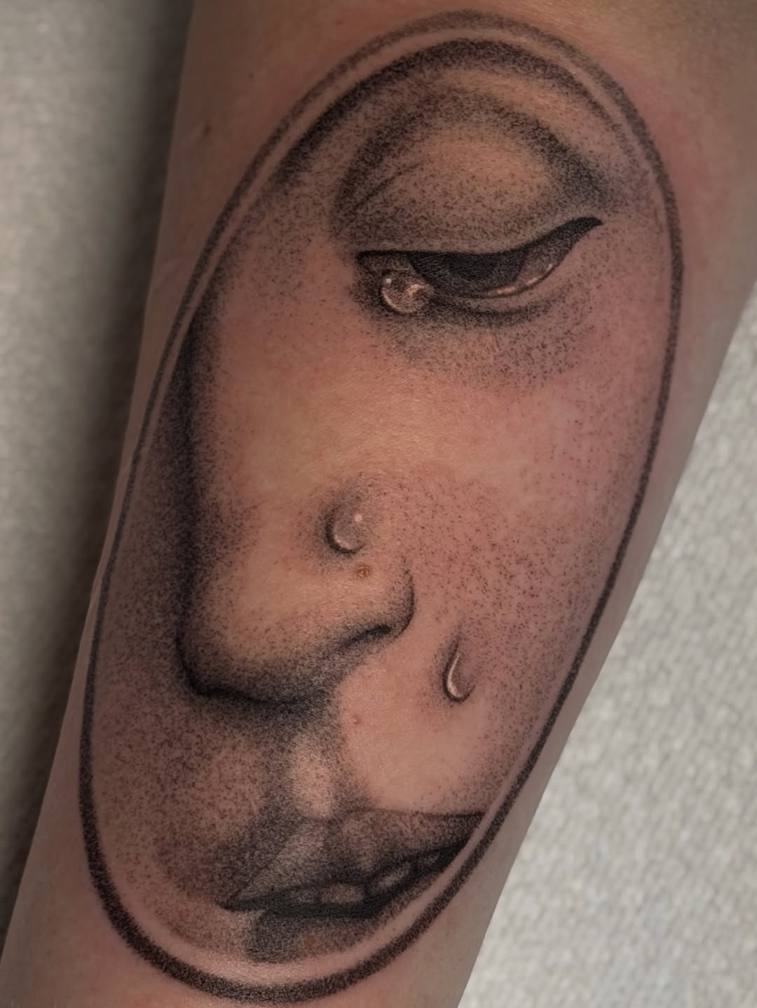 Tattoo by @uglyrae.tattoo — dotwork, realism