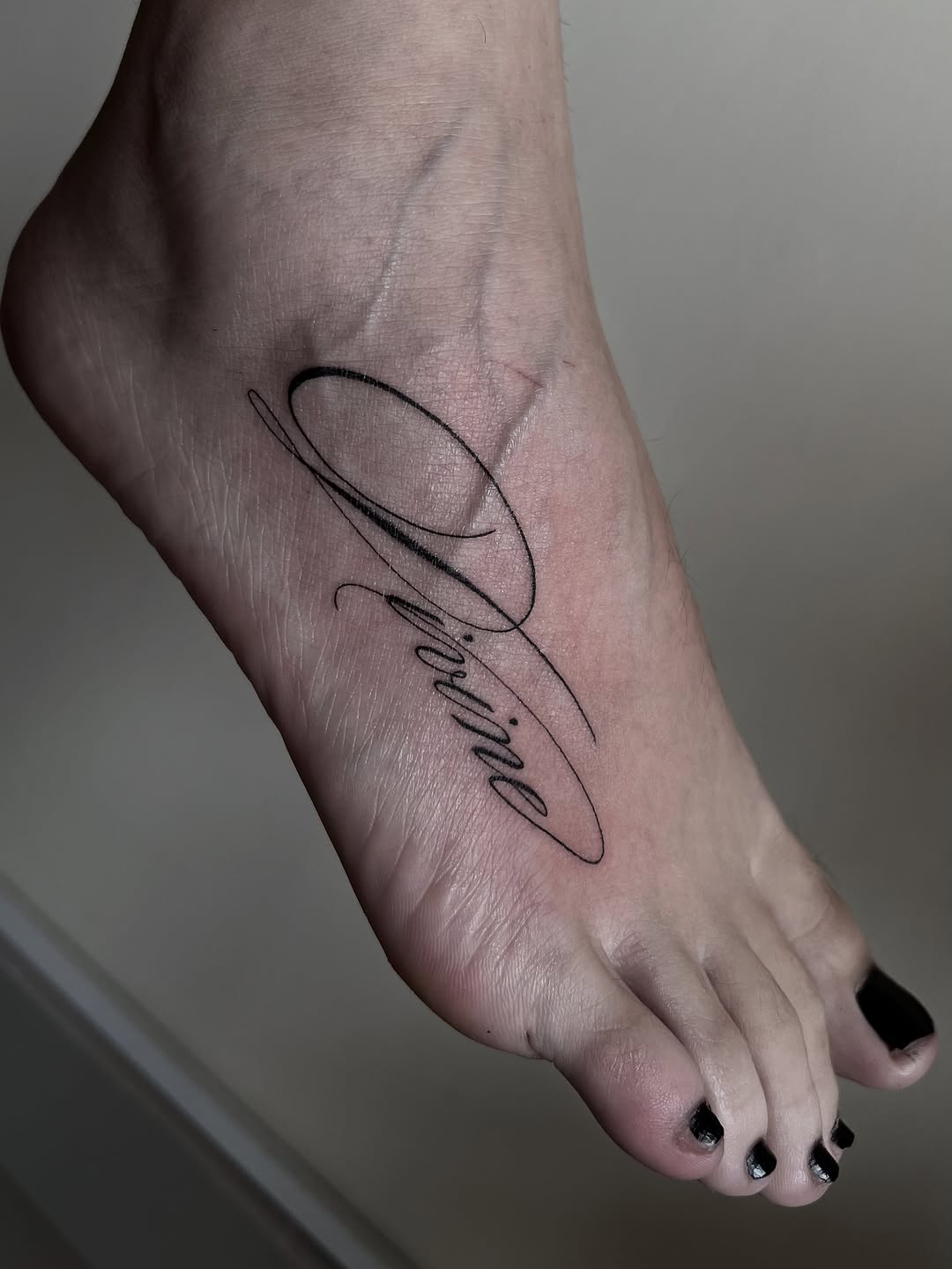 Tattoo by @deza.art — lettering_script, fine_line