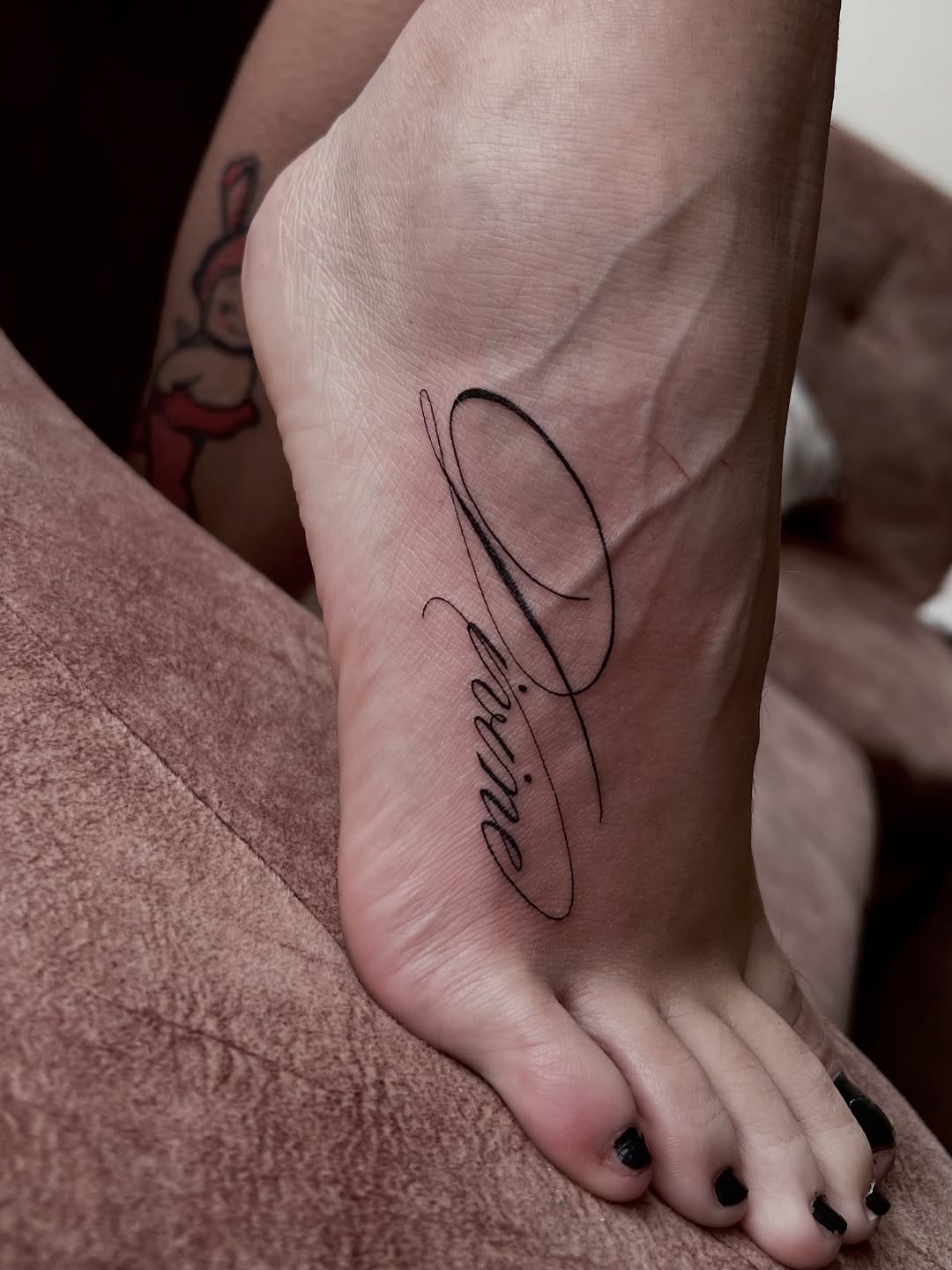 Tattoo by @deza.art — lettering_script, fine_line