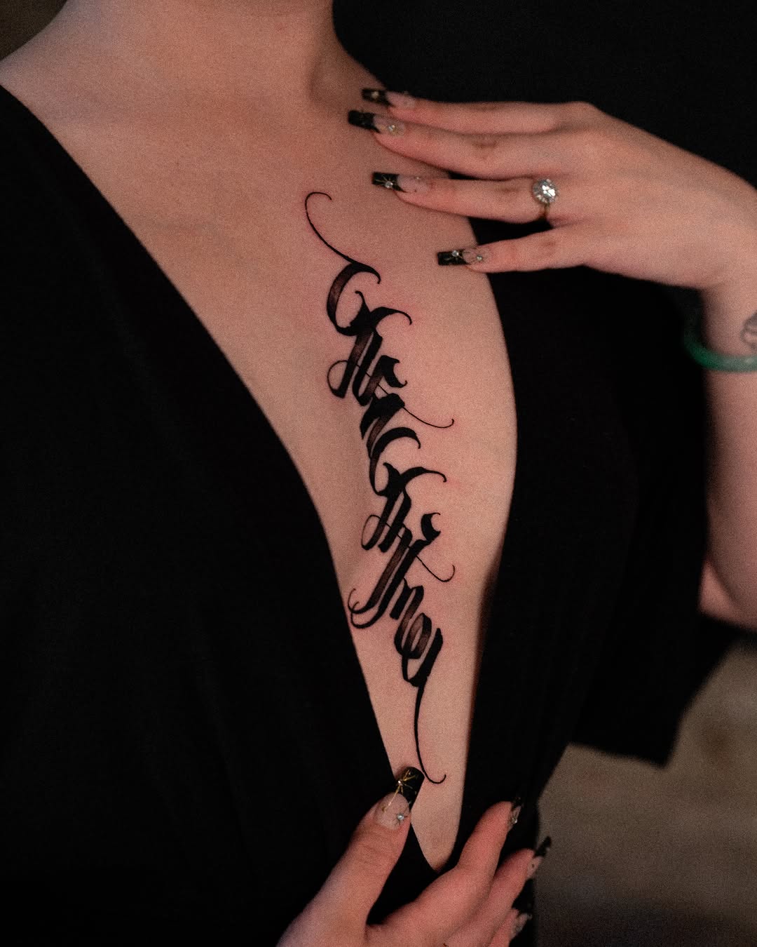 Tattoo by @low.original — lettering_script, blackwork