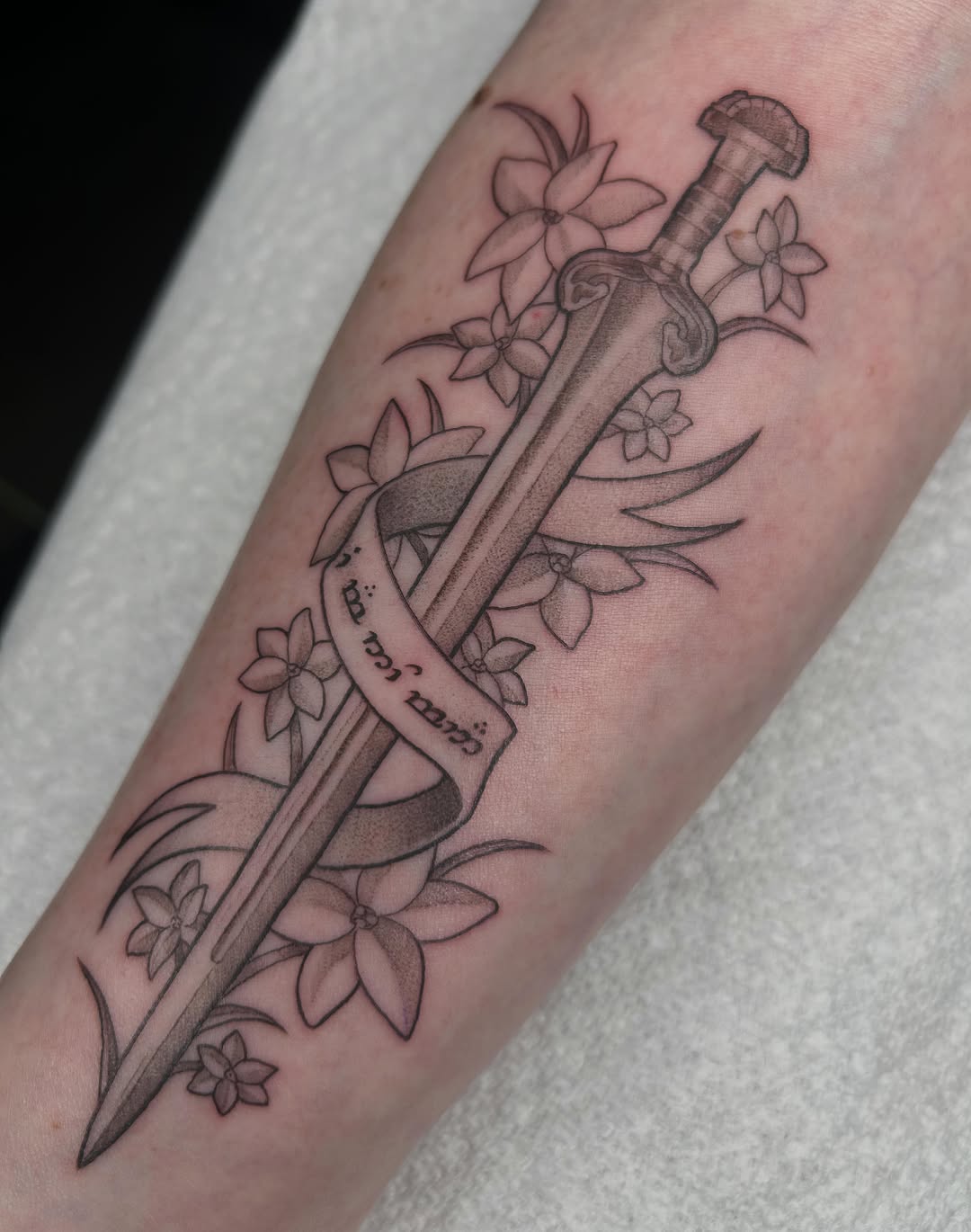 Tattoo by @frostyflakes.ink — black_and_grey, lettering_script