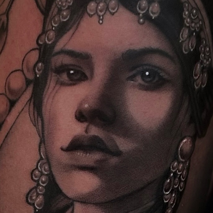 Tattoo by @stretched.marks.tattoo — realism, black_and_grey
