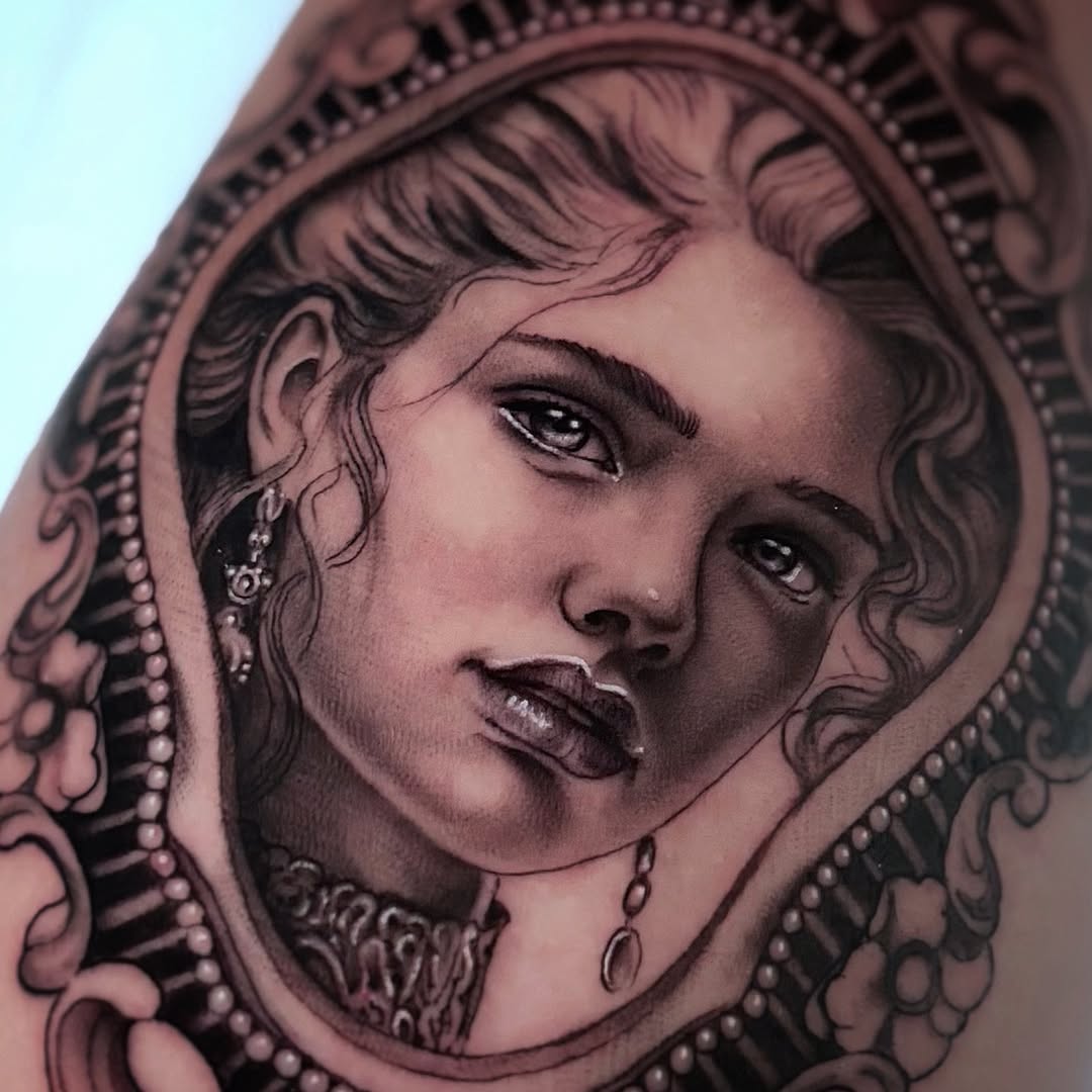 Tattoo by @stretched.marks.tattoo — realism, black_and_grey