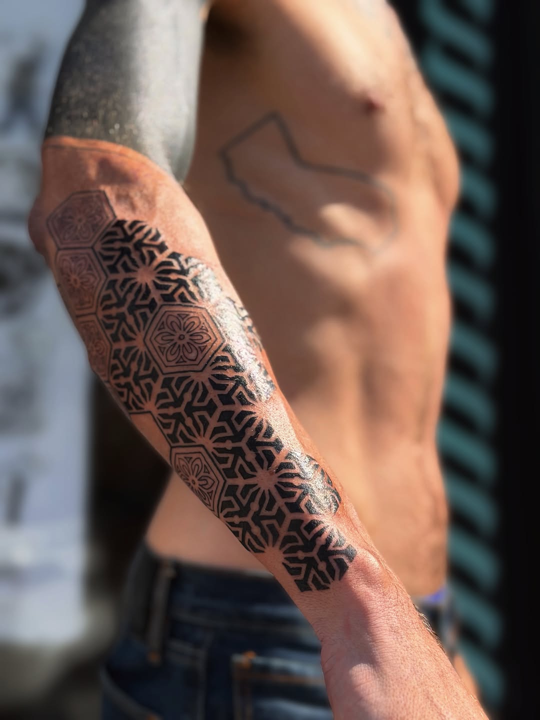 Tattoo by @mystic_tattooing — geometric, blackwork