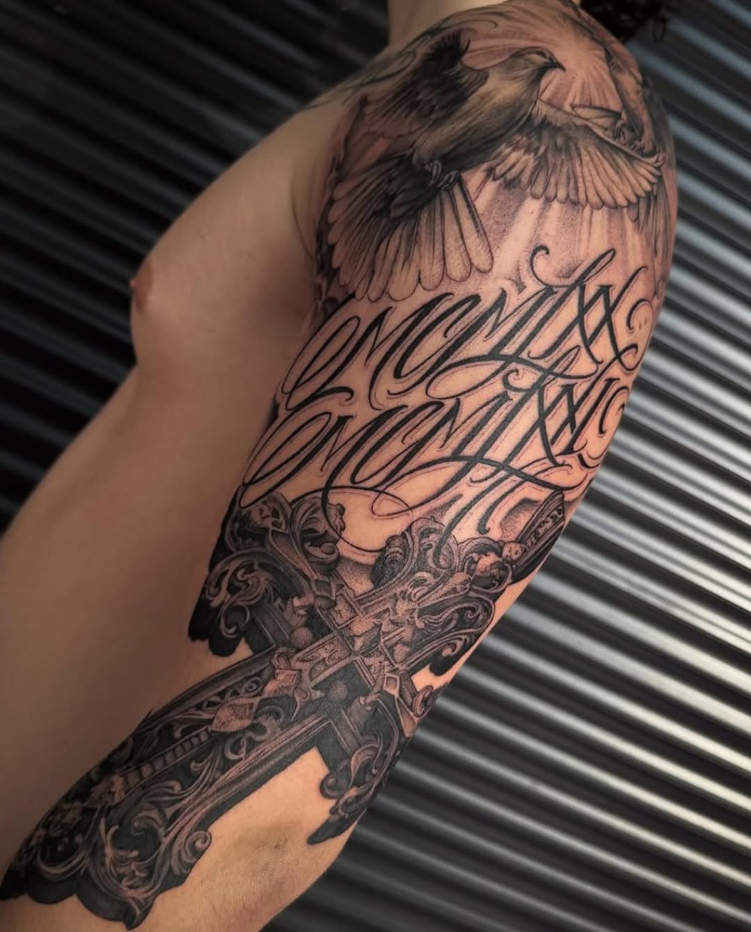 Tattoo by @dopeletterstattoo — lettering_script, black_and_grey
