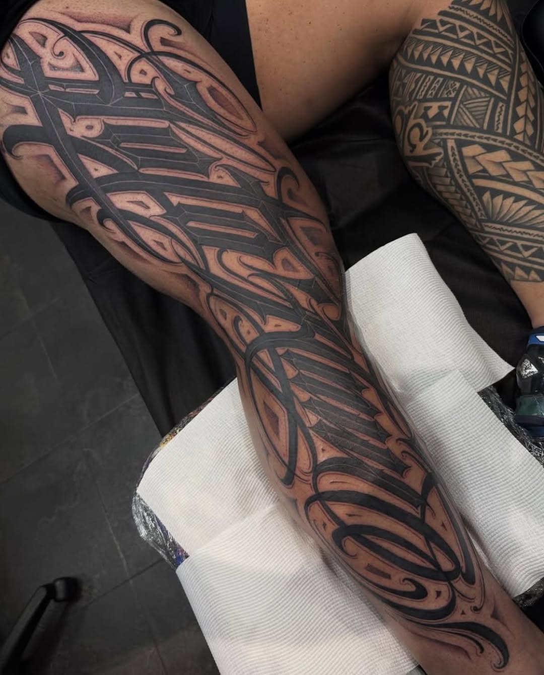 Tattoo by @dopeletterstattoo — lettering_script, blackwork