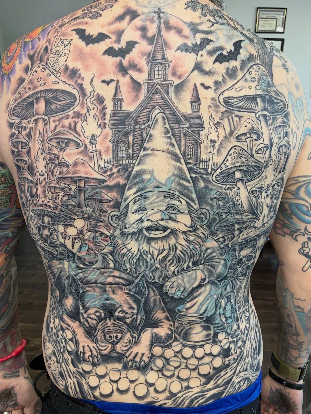 Tattoo by @streetmeat.tat — realism, black_and_grey