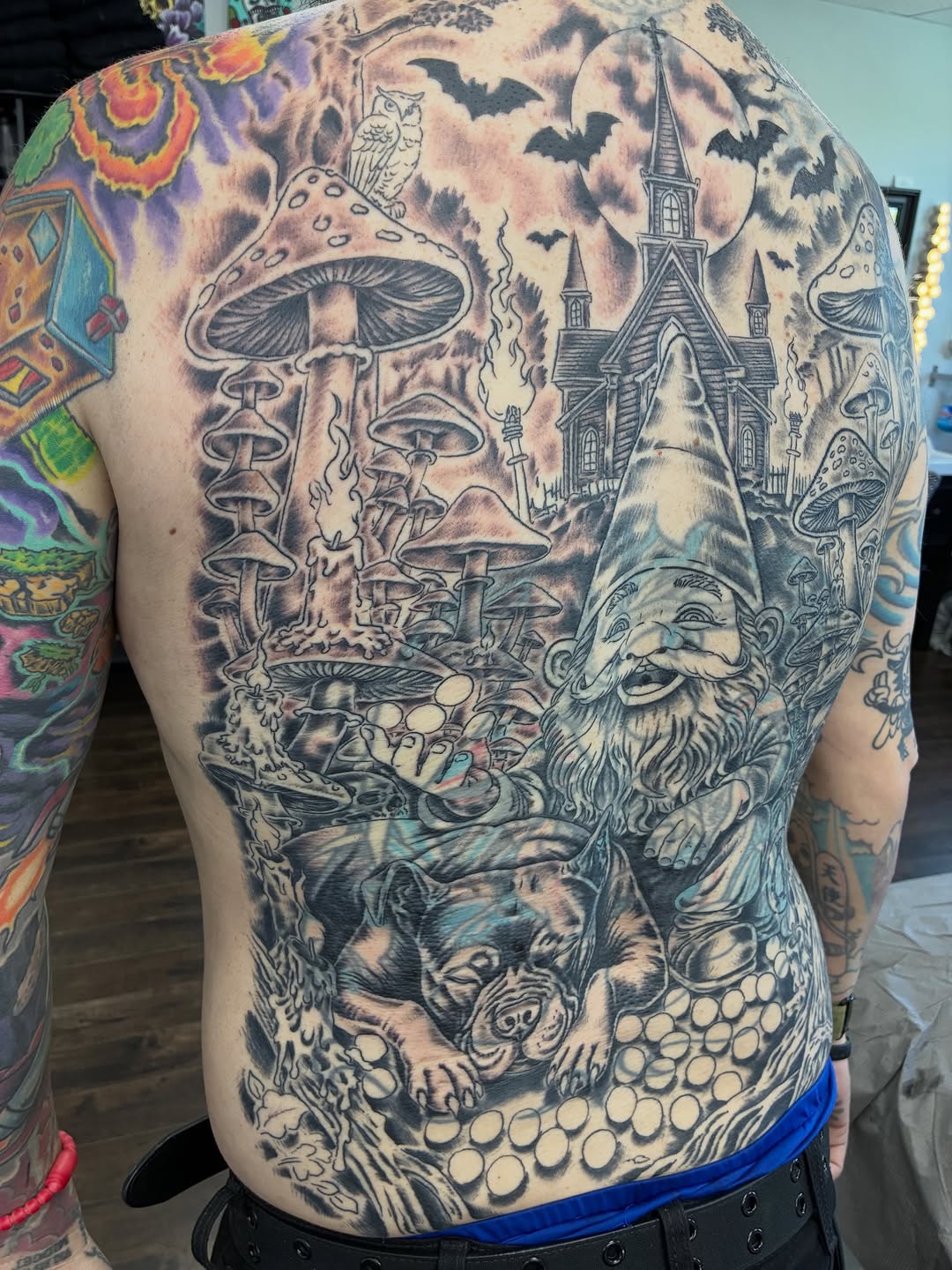 Tattoo by @streetmeat.tat — realism, black_and_grey