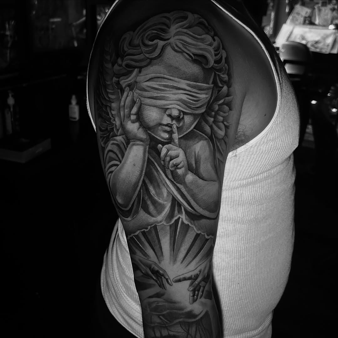 Tattoo by @acruz_707 โ realism, black_and_grey