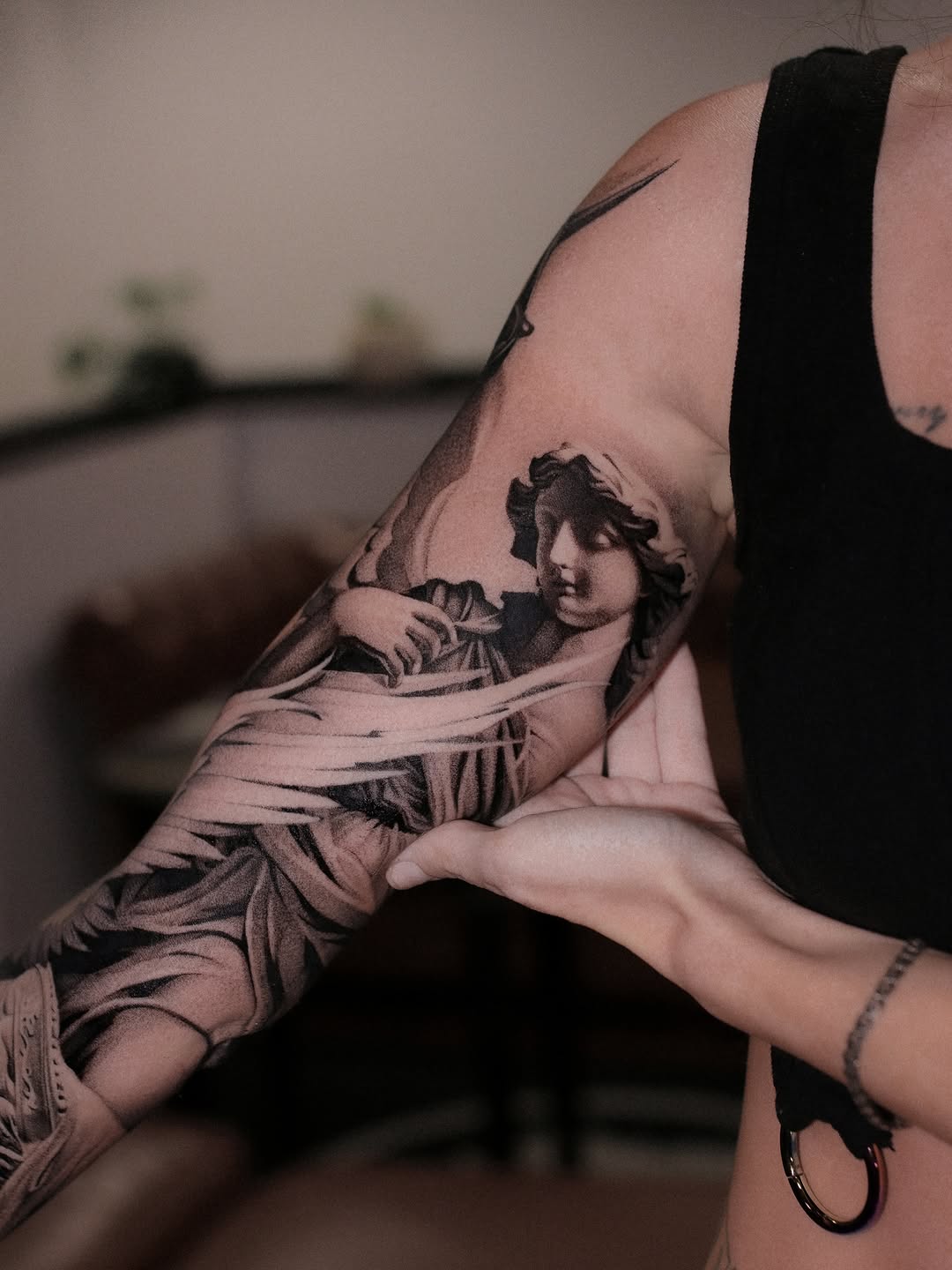 Tattoo by @cot_tattoo โ realism, black_and_grey