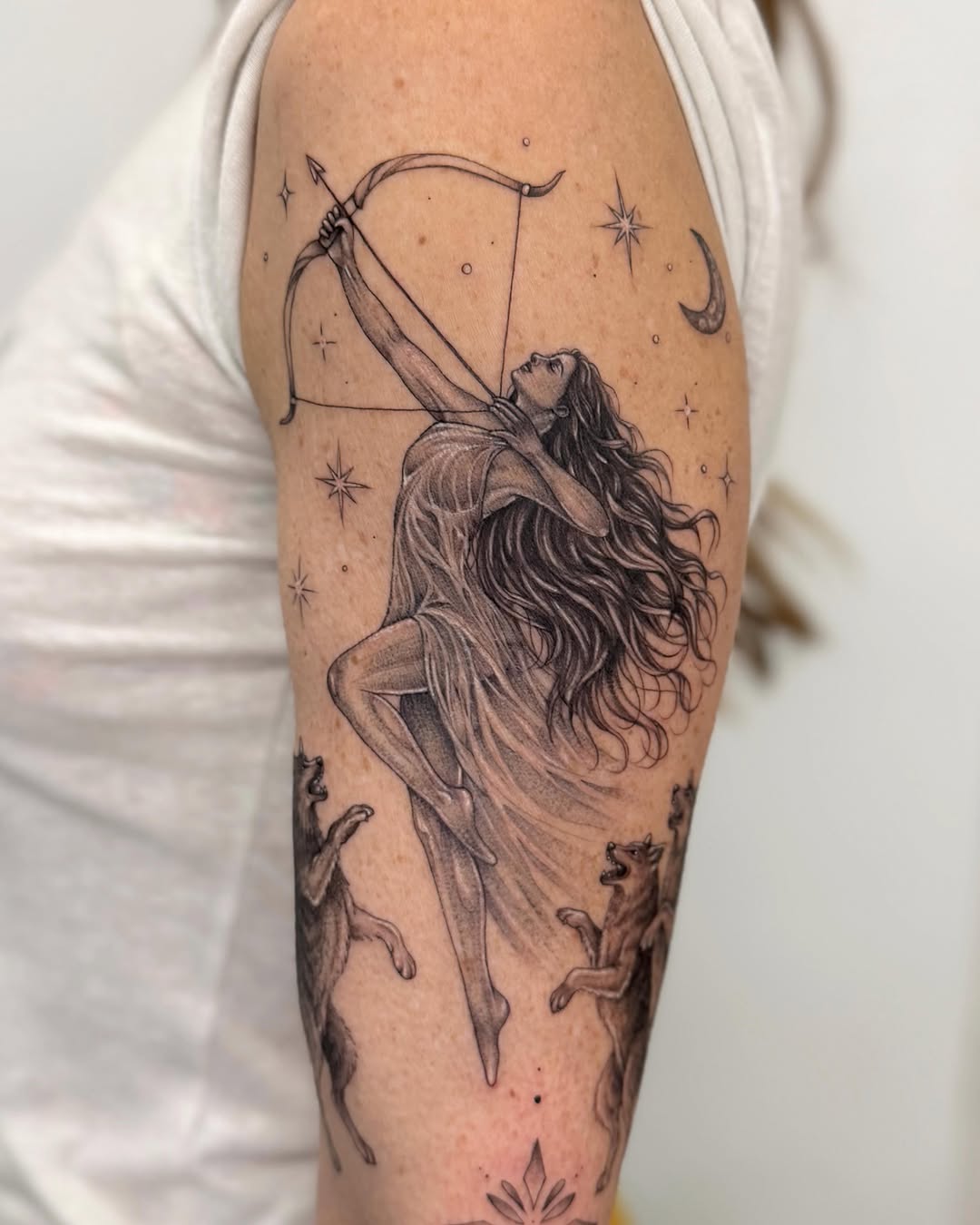 Tattoo by @nganvu.tattoo — realism, black_and_grey