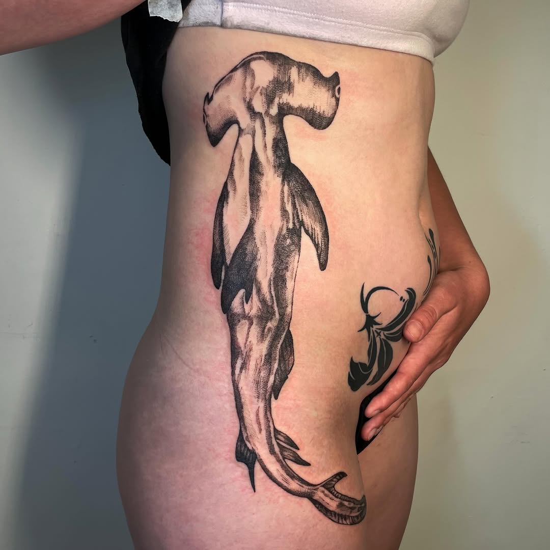 Tattoo by @iris.tats — black_and_grey, illustrative