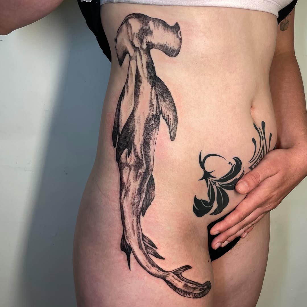 Tattoo by @iris.tats — black_and_grey, realism