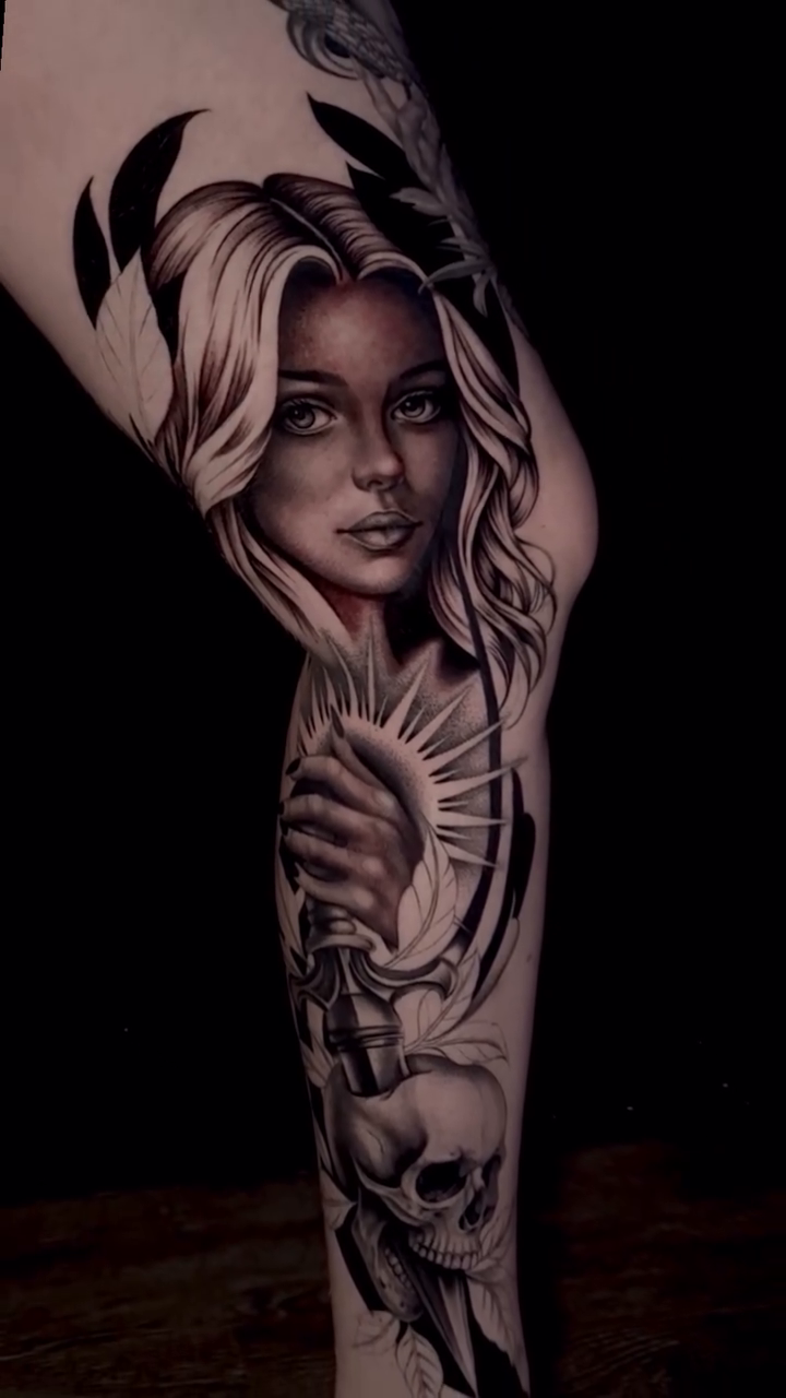 Tattoo by @taboo.tattoos_ — realism, black_and_grey