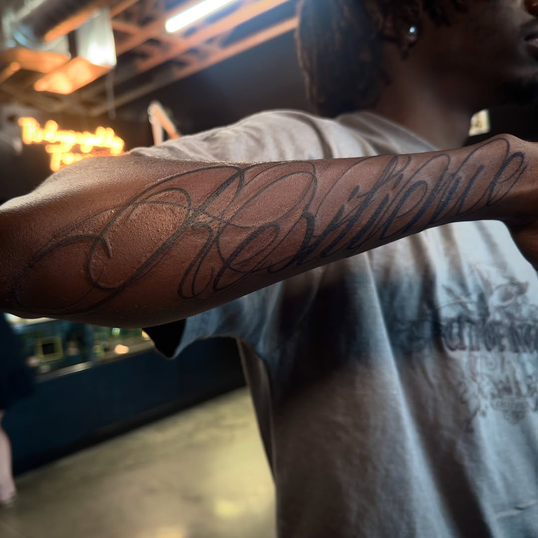 Tattoo by @severin0art — lettering_script, illustrative