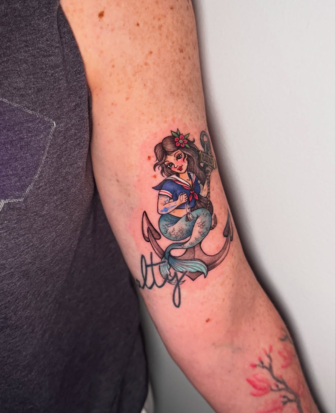 Tattoo by @squidink.ks — american_traditional, lettering_script