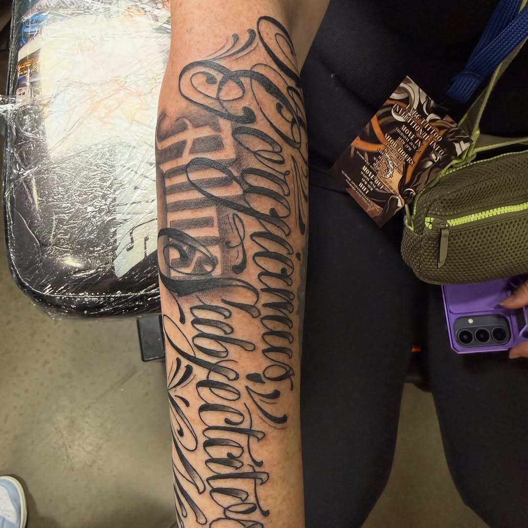Tattoo by @taylormillstattoos — lettering_script, chicano
