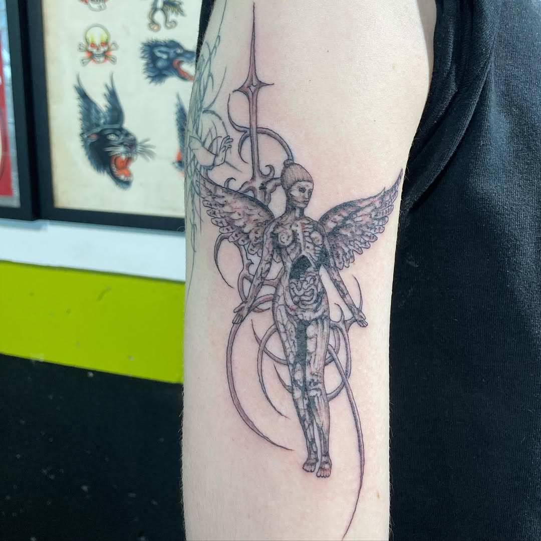 Tattoo by @queendaddytattoos — black_and_grey, dark_realism