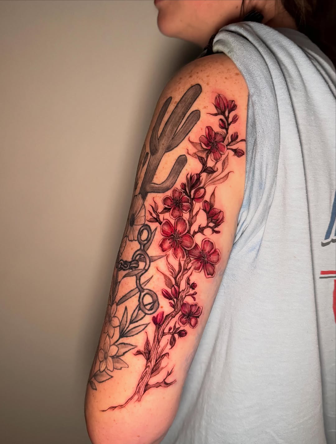 Tattoo by @squidink.ks — black_and_grey, realism
