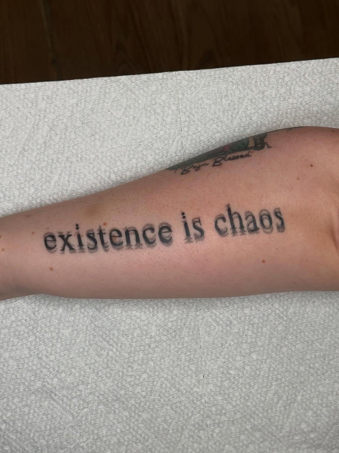 Tattoo by @maxwell.tattoos — lettering_script, illustrative