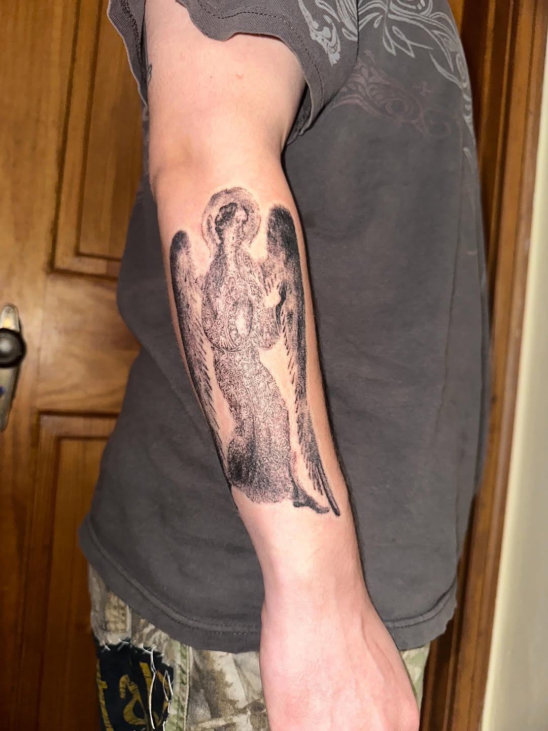 Tattoo by @gregory.bramble — black_and_grey, realism