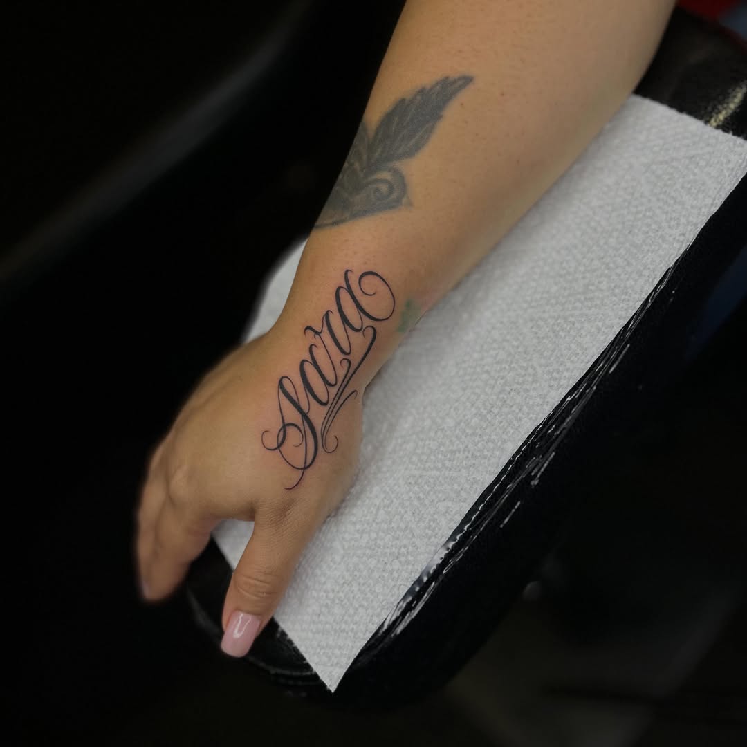 Tattoo by @benji_tattoos714 — lettering_script, black_and_grey